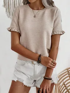 Close-up of beige round neck T-shirt with textured fabric and ruffle sleeves