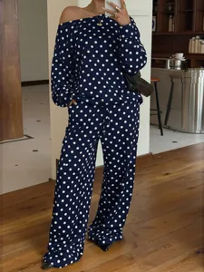 Stylish polka dot loungewear set featuring off-the-shoulder top and wide leg pants