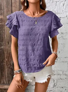 Detailed view of women's purple smocked top with elegant double ruffle sleeves