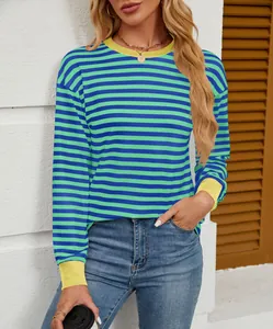Detailed look at striped crew neck top with contrast yellow ribbed cuffs and collar