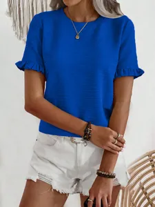 Detail view of royal blue textured short sleeve T-shirt with stylish ruffle cuffs.
