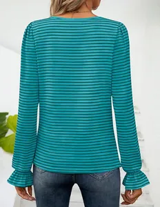 Back view of a teal striped long sleeve T-shirt with elegant ruffled cuffs detail.