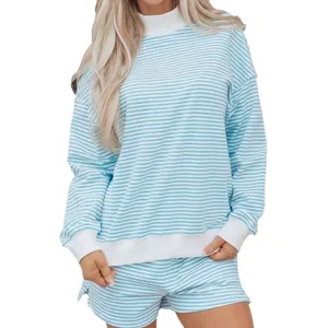 Casual women's blue and white striped oversized cotton sweatshirt and shorts lounge set