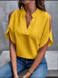 Detailed view of the yellow V-neck cold shoulder chiffon blouse worn by a female model