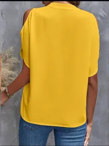 Back view of a stylish yellow cold-shoulder chiffon blouse with a relaxed and loose fit.