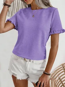 Close-up detail of purple textured summer T-shirt with stylish ruffle sleeves