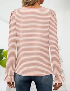 Back view of pink striped square neck long sleeve top with ruffle cuffs and flared sleeves