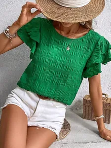 Casual green round neck blouse with double ruffle sleeves and smocked texture.