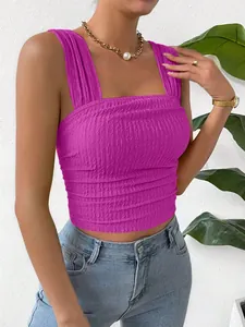 Close-up of vibrant purple smocked square-neck crop top with ruched texture