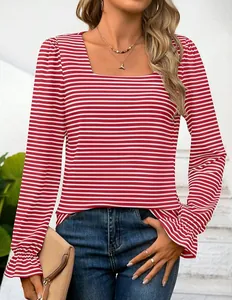 Detail view of red striped long-sleeve shirt with square neck and ruffled cuffs