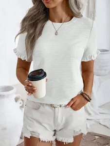 Detail showing ruffle sleeves and textured white fabric of the crew neck T-shirt