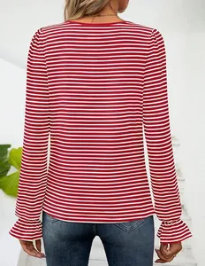 Back view of a red and white striped long sleeve t-shirt with elegant ruffle cuffs.