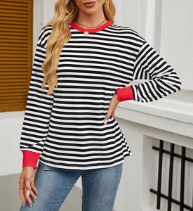 Women's black and white striped long sleeve top with red contrast collar and cuffs