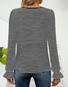 Detailed back view of a black and white striped long sleeve T-shirt featuring ruffle cuffs