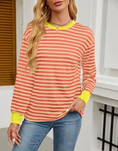 Detail showing pink and beige striped pattern with contrasting neon yellow ribbed trim.
