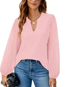 Elegant pink V-neck chiffon blouse with delicate textured lace patchwork sleeves