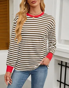 Detail of a casual striped long-sleeve top featuring red contrast cuffs and neck.
