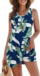 Detail view of hollow-out eyelet fabric on tropical leaf print vacation dress