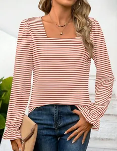 Detail view of red and white striped top featuring ruffled cuffs and square neck design