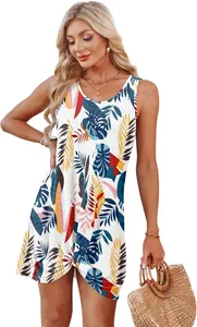 Detail view of summer beach dress featuring a tropical leaf print and twist-knot hem