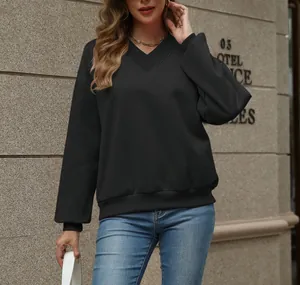 Detail of women's black V-neck loose sweatshirt with soft fleece lining