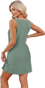 Detailed back view of a sleeveless green hollow-out crochet beach dress for summer vacation
