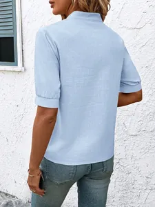 Detailed back view of a light blue V-neck short sleeve cotton shirt with natural texture