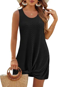 Detail of black hollow sleeveless dress with twist knot hem for summer beach vacation