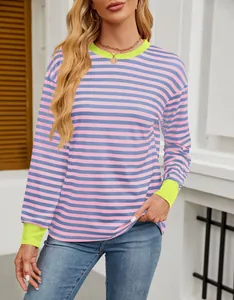 Fashionable striped crew neck long sleeve top with neon green contrast knit cuffs