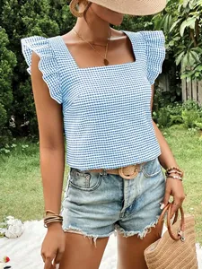 Close-up of a blue and white gingham blouse with square neck and ruffle sleeves