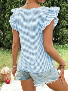 Detailed back view of a blue and white gingham blouse featuring elegant flutter sleeves