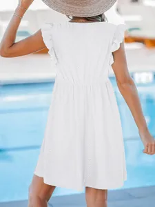 Detailed back view of a white V-neck lace eyelet summer dress with ruffle sleeves