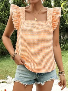 Stylish orange and white gingham square neck blouse with feminine ruffle sleeves for summer.