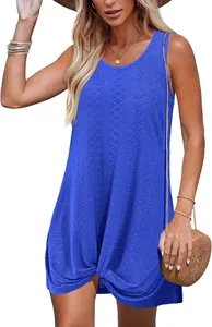 Detail showing the blue hollow-out lace fabric texture and the stylish twisted knot at the hem.