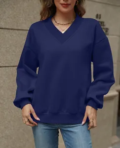 Detailed view of a navy blue V-neck oversized fleece sweatshirt with loose fit style