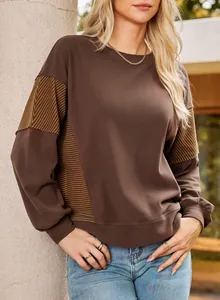 Brown long sleeve sweatshirt featuring stylish striped side and sleeve paneling.