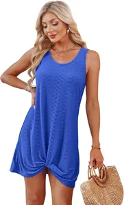 Detail of blue hollow-out crochet beach dress with sleeveless design and hem knot.