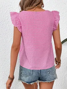 Back view of a pink and white gingham checkered top with ruffled flutter sleeves.