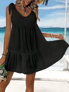 Loose black summer beach cover-up dress with adjustable shoulder ties and ruffles
