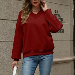 Women's burgundy V-neck sweatshirt in a loose fit, perfect for autumn and winter wear