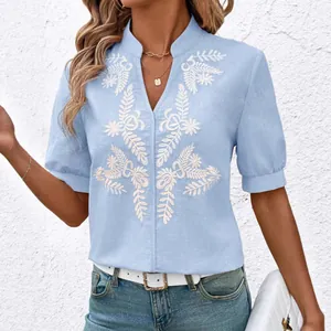 Light blue V-neck cotton blouse with white floral embroidery for women summer wear.