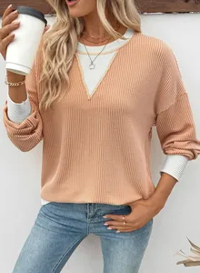 Detailed view of casual color-block waffle knit sweatshirt with ribbed cuffs for women