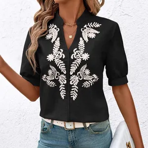 Elegant V-neck black cotton shirt with intricate white floral embroidery for summer wear.