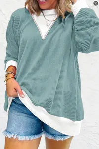 Close-up of casual loose waffle knit color-blocked long sleeve sweatshirt for women