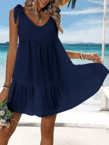 Summer dark blue beach cover-up dress with bow shoulder straps and tiered hemline