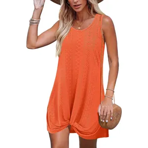 Sleeveless summer beach vacation dress with hollow-out pattern and twist knot in orange color