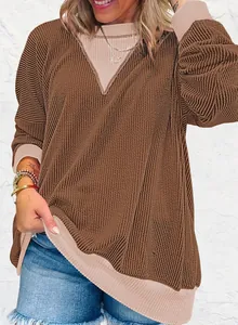 Detail of women's loose color-block ribbed long sleeve sweatshirt in brown and beige.