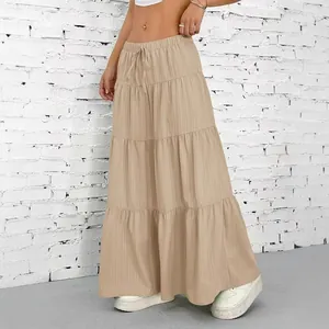 Detail view of women's khaki pleated tiered maxi skirt with drawstring waist