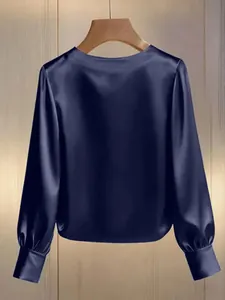 Elegant navy blue French style satin blouse with long sleeves and round neck detail