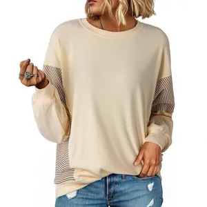 Casual cream round-neck sweatshirt with stylish striped patchwork sleeves for women